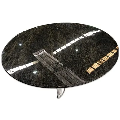 طاولة طعام بقاعدة مستديرة من الجرانيت الأسود من مارتيكس