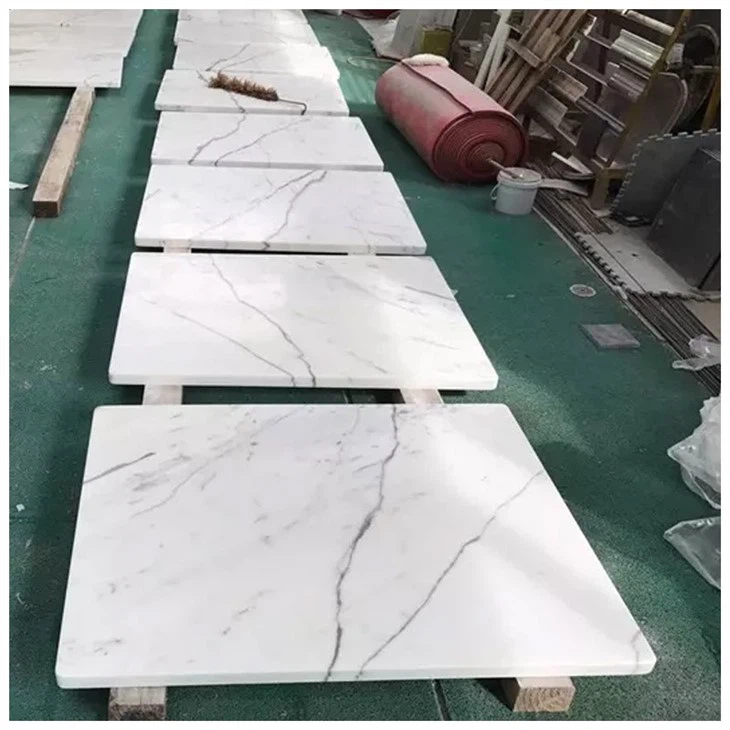 white statuario venato marble tile